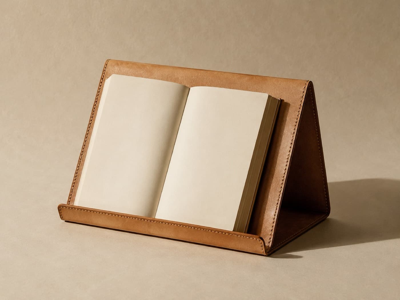 Reading Stand Sleeve, Foldable — Folds into a wedge and holds a book open at reading angle. Unfolds flat to store.
