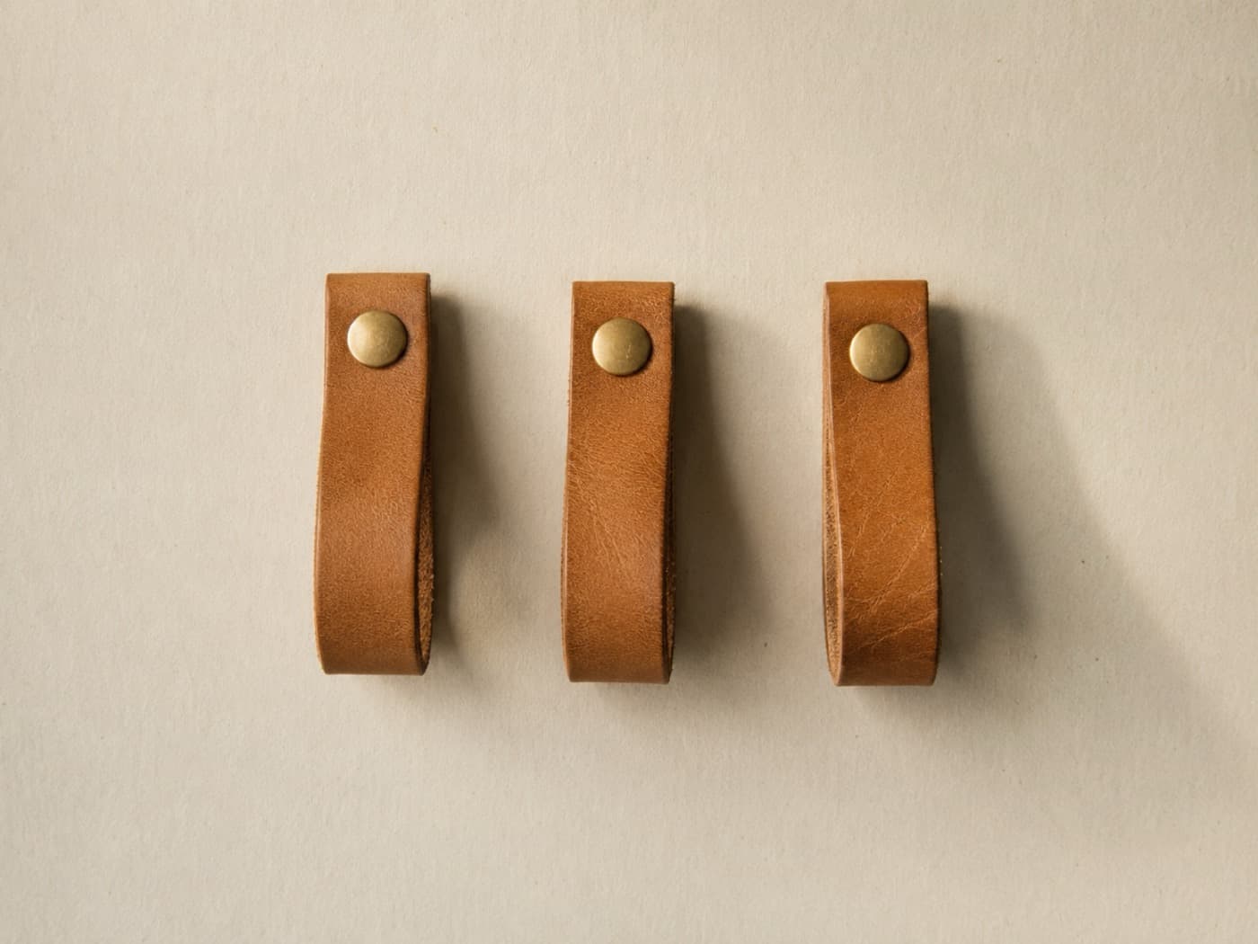 Wall Hook Leather Loop, Set of 3 — Three snapped loops for a rail or a row of pegs. Light items only.